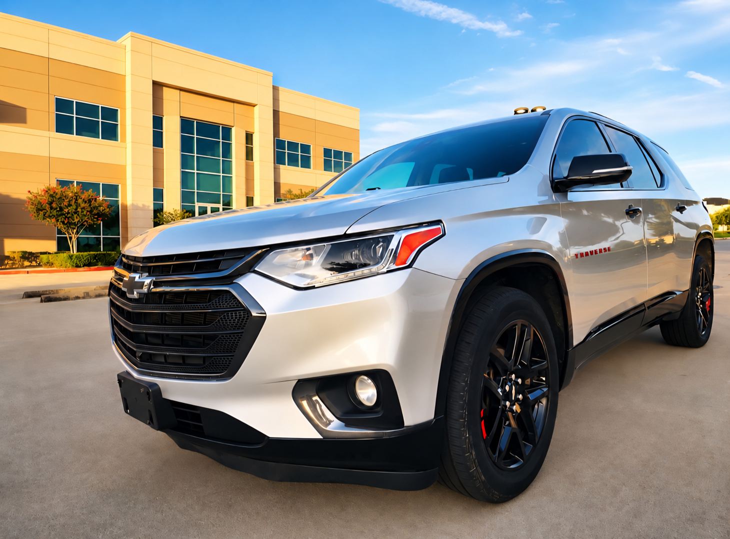 Chevrolet Traverse with yellow building in the background